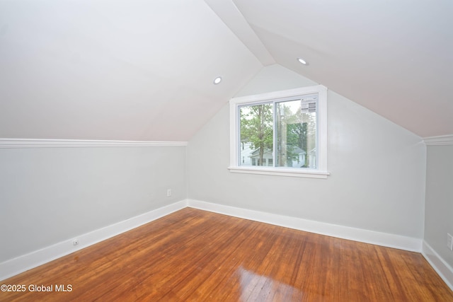 35 Wallace St, Scotia, NY 12302 - additional living space with baseboards, hardwood / wood-style flooring, vaulted ceiling, and recessed lighting