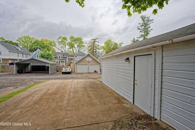 35 Wallace St, Scotia, NY 12302 - detached garage featuring a residential view