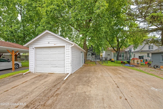 35 Wallace St, Scotia, NY 12302 - detached garage featuring concrete driveway