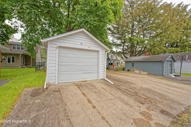 35 Wallace St, Scotia, NY 12302 - detached garage featuring driveway