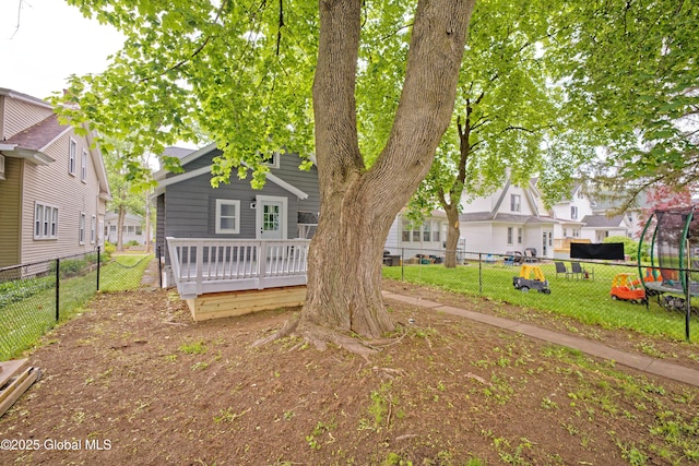 35 Wallace St, Scotia, NY 12302 - view of front of property with a wooden deck, a fenced backyard, and a trampoline