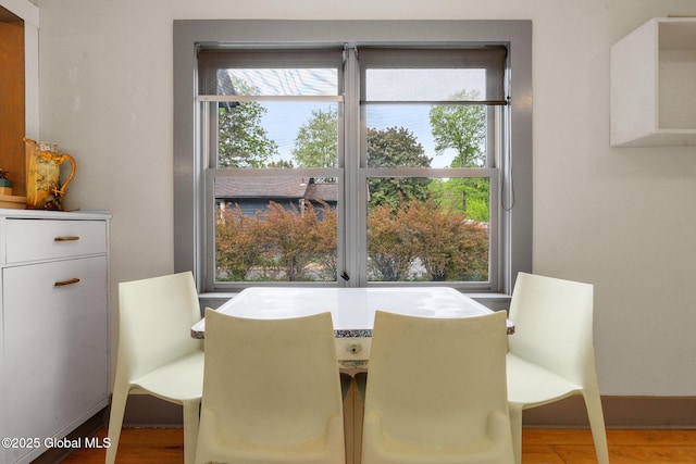 406 Northern Pines Rd, Wilton, NY 12831 - dining area with healthy amount of natural light and wood finished floors