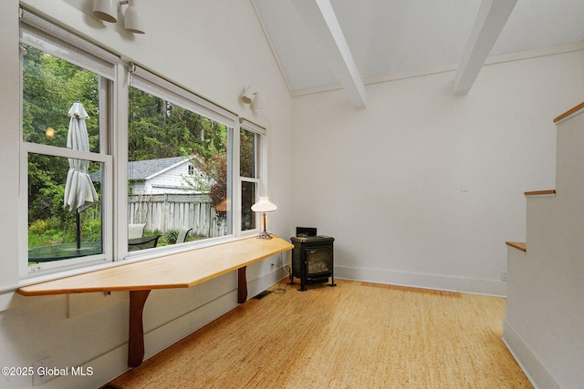406 Northern Pines Rd, Wilton, NY 12831 - sunroom / solarium with healthy amount of natural light and a wood stove