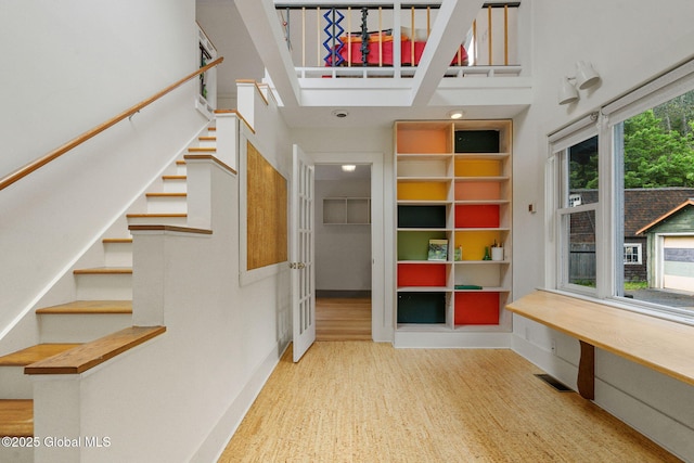 406 Northern Pines Rd, Wilton, NY 12831 - stairway with a towering ceiling and baseboards