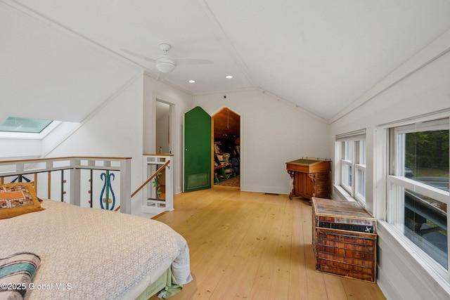 406 Northern Pines Rd, Wilton, NY 12831 - bedroom with a skylight, hardwood / wood-style floors, lofted ceiling, a ceiling fan, and ornamental molding