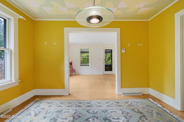 406 Northern Pines Rd, Wilton, NY 12831 - empty room with crown molding, wood finished floors, and baseboards