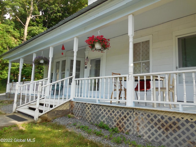 114 Washington St, Sharon Springs, NY 13459 - view of side of home featuring covered porch