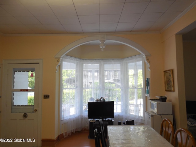 114 Washington St, Sharon Springs, NY 13459 - dining space with ornamental molding, plenty of natural light, and arched walkways