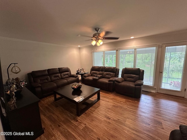 5 Wincrest Dr, Queensbury, NY 12804 - living area featuring crown molding, wood finished floors, healthy amount of natural light, and a ceiling fan