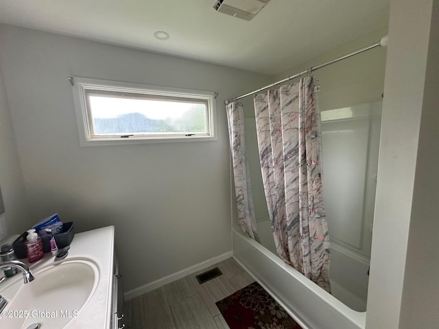 5 Wincrest Dr, Queensbury, NY 12804 - bathroom featuring shower / tub combo with curtain, vanity, and baseboards