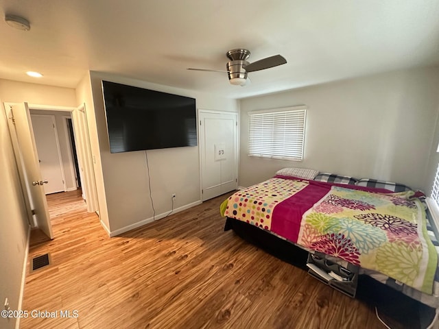 5 Wincrest Dr, Queensbury, NY 12804 - bedroom with wood finished floors, a closet, ceiling fan, and baseboards