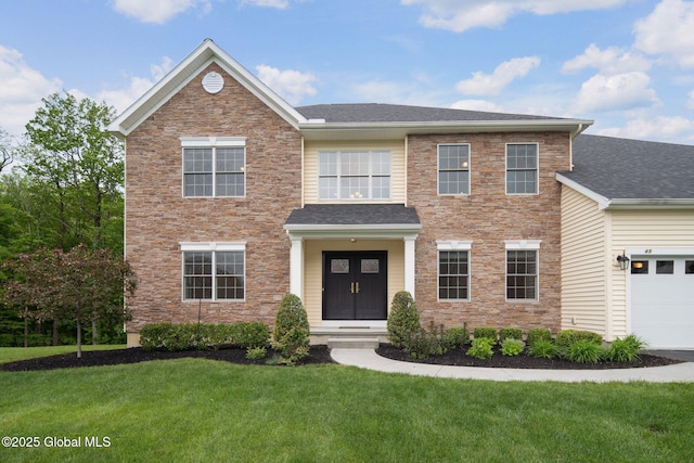 45 Tamarack Ln, Colonie, NY 12309 - view of front of property with a front yard, stone siding, a garage, and a shingled roof