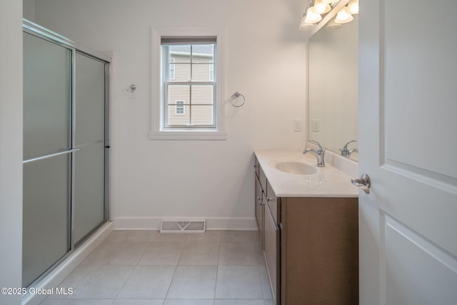 45 Tamarack Ln, Colonie, NY 12309 - full bath with vanity, baseboards, a shower with shower door, and tile patterned flooring