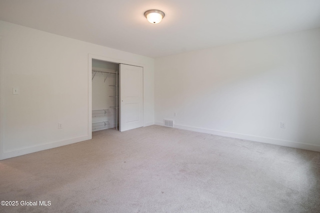 45 Tamarack Ln, Colonie, NY 12309 - unfurnished bedroom featuring light colored carpet, a closet, and baseboards