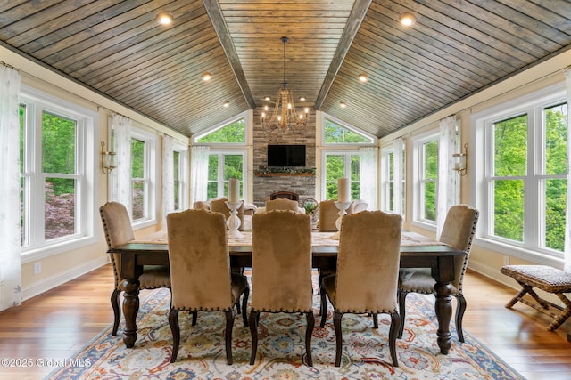 41 Tipperary Way, Clifton Park, NY 12019 - dining space featuring wood ceiling, baseboards, wood finished floors, and a chandelier