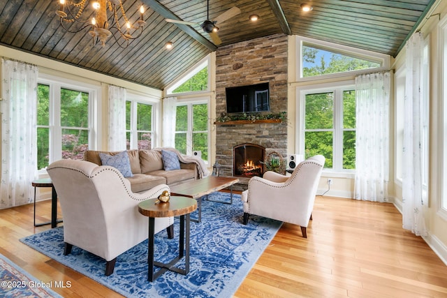 41 Tipperary Way, Clifton Park, NY 12019 - living room with wood ceiling, a stone fireplace, wood finished floors, a chandelier, and high vaulted ceiling