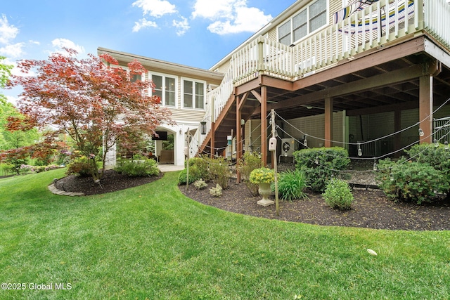 41 Tipperary Way, Clifton Park, NY 12019 - back of property with a lawn, a wooden deck, and stairway