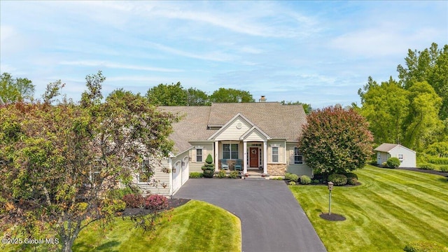 19 Hidden Farm Ln, Halfmoon, NY 12118 - view of front of property featuring asphalt driveway, a front lawn, and a chimney