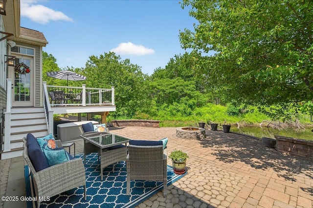 19 Hidden Farm Ln, Halfmoon, NY 12118 - view of patio with an outdoor living space with a fire pit