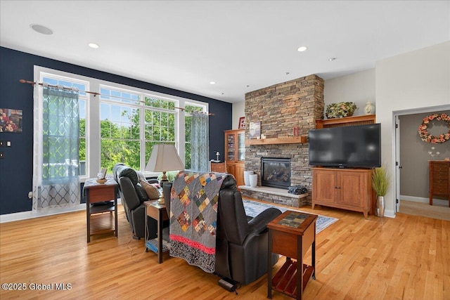 19 Hidden Farm Ln, Halfmoon, NY 12118 - living area featuring light wood-style flooring, a fireplace, baseboards, and recessed lighting