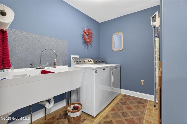 19 Hidden Farm Ln, Halfmoon, NY 12118 - washroom with washer and clothes dryer and baseboards