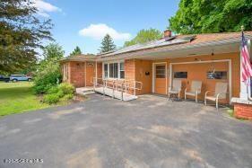 8 Adams Ave, East Greenbush, NY 12144 - view of front facade featuring a patio area
