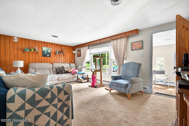 8 Adams Ave, East Greenbush, NY 12144 - living room with carpet floors, wooden walls, and a baseboard radiator
