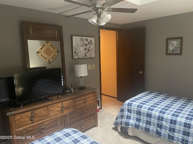 11K Overlook Ln, Warrensburg, NY 12817 - bedroom with light colored carpet and ceiling fan