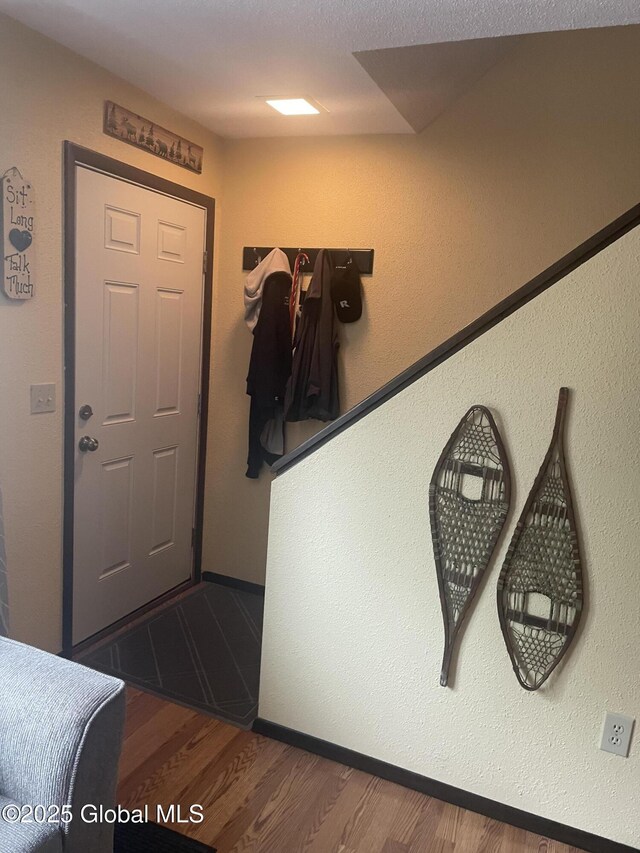 11K Overlook Ln, Warrensburg, NY 12817 - foyer entrance featuring wood finished floors and baseboards