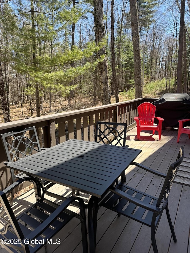 34 Park Rd, Johnsburg, NY 12843 - wooden deck featuring outdoor dining area