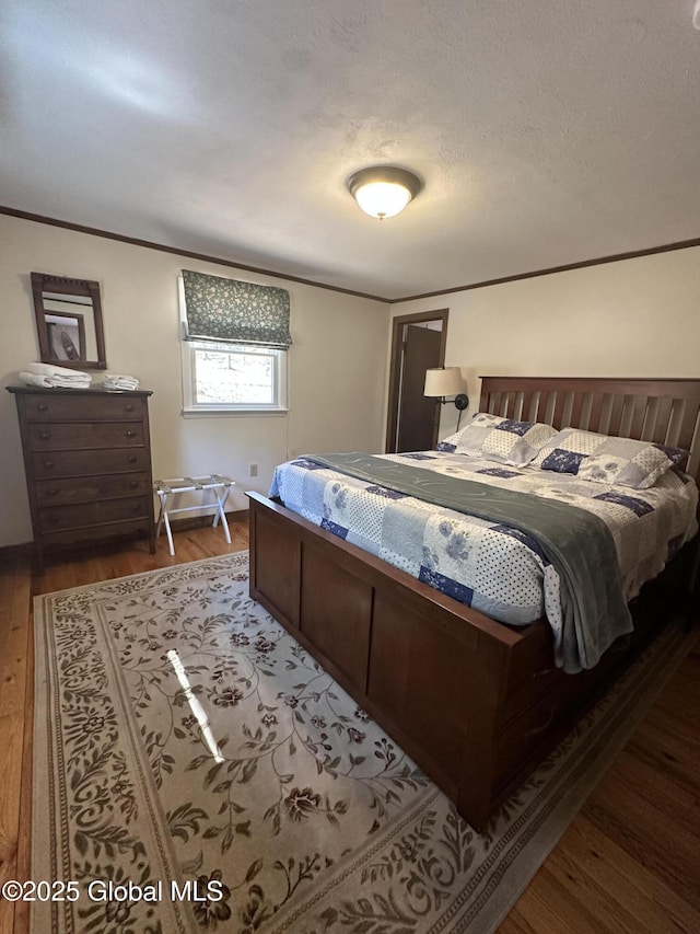 34 Park Rd, Johnsburg, NY 12843 - bedroom with wood finished floors and crown molding