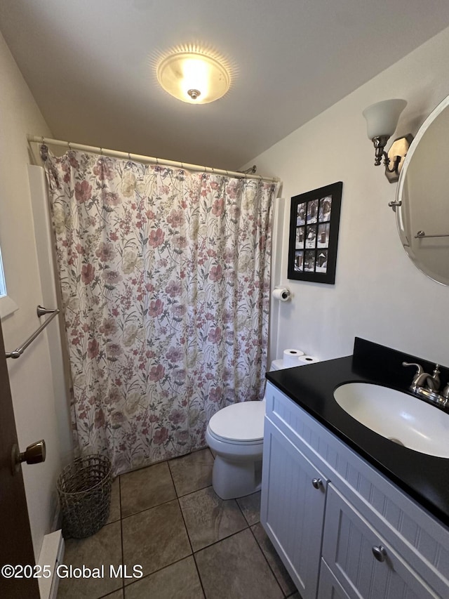 34 Park Rd, Johnsburg, NY 12843 - bathroom with toilet, vanity, tile patterned floors, and a shower with shower curtain