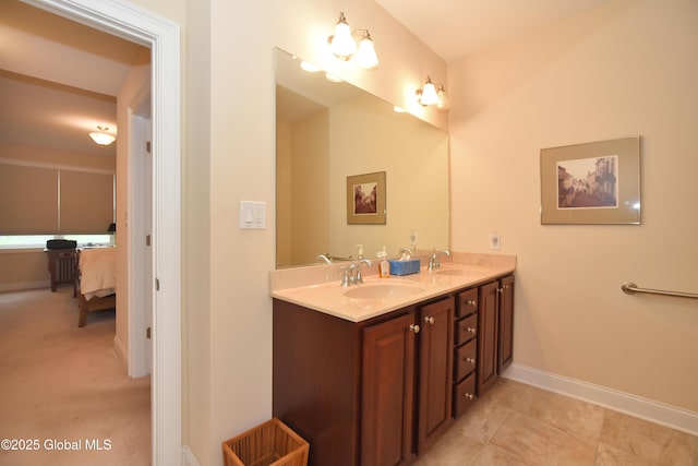 509 Lois Ln, Niskayuna, NY 12304 - full bath featuring double vanity, baseboards, and ensuite bathroom