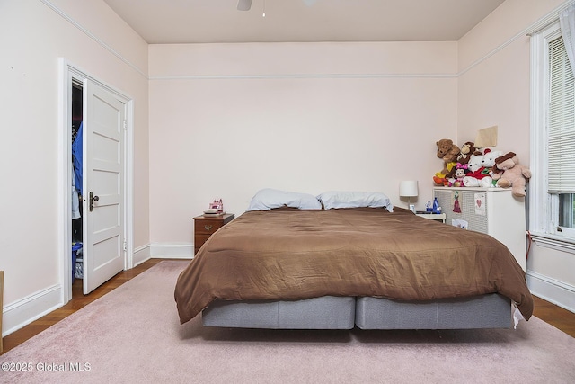 1466 3rd St, Rensselaer, NY 12144 - bedroom featuring baseboards and wood finished floors