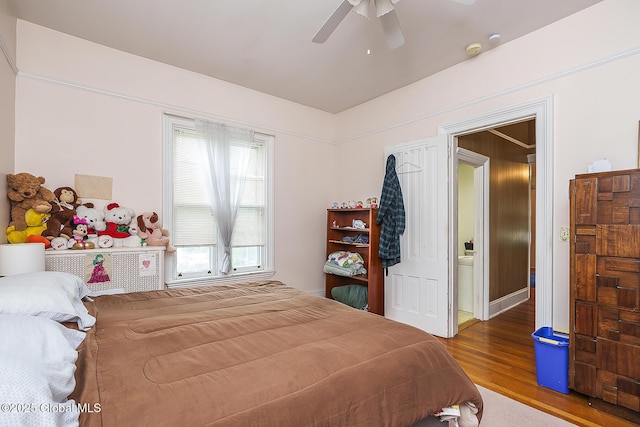 1466 3rd St, Rensselaer, NY 12144 - bedroom with wood finished floors and ceiling fan