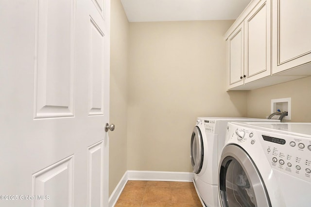 779 Waldens Pond, Guilderland, NY 12203 - laundry area with cabinet space, separate washer and dryer, baseboards, and light tile patterned floors