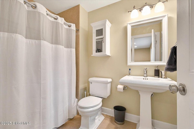 779 Waldens Pond, Guilderland, NY 12203 - full bath with tile patterned floors, toilet, a shower with shower curtain, and baseboards
