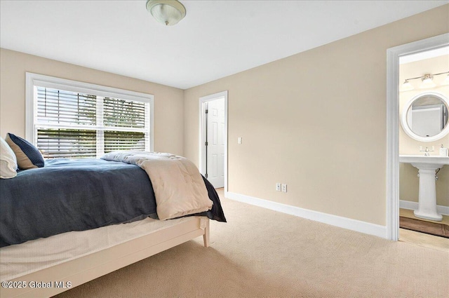 779 Waldens Pond, Guilderland, NY 12203 - carpeted bedroom with baseboards and connected bathroom