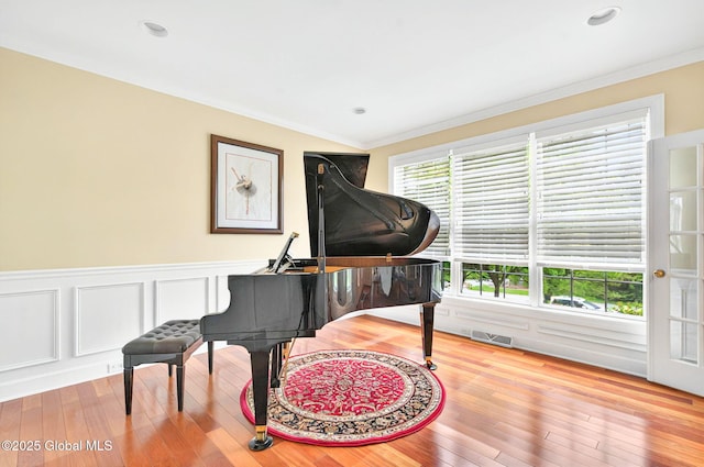 779 Waldens Pond, Guilderland, NY 12203 - sitting room with crown molding, hardwood / wood-style floors, and a wainscoted wall