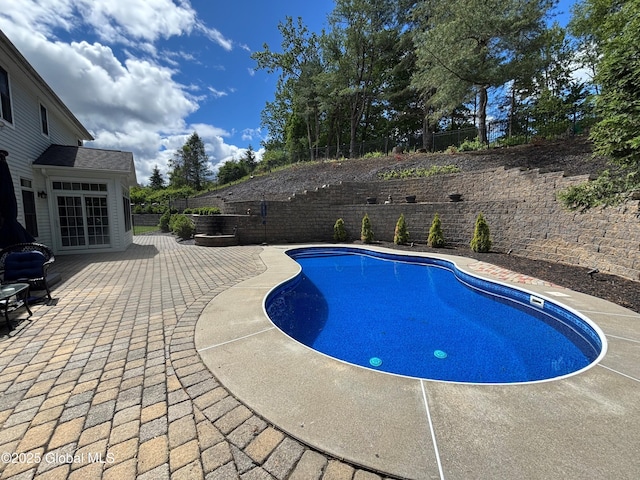 779 Waldens Pond, Guilderland, NY 12203 - view of swimming pool featuring a patio and a fenced backyard