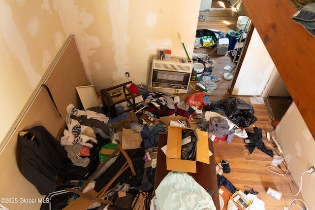 1864 7th Ave, Watervliet, NY 12189 - miscellaneous room featuring heating unit and wood finished floors