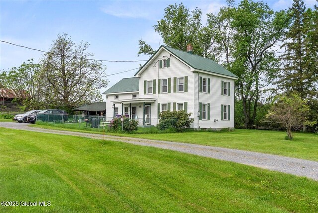 4248 Western Tpke, Guilderland, NY 12009 - view of front facade featuring a chimney and metal roof