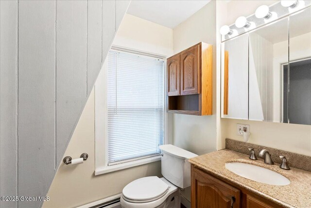 4248 Western Tpke, Guilderland, NY 12009 - bathroom with toilet, vanity, and a baseboard radiator
