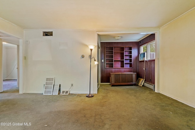 393 Whitehall Rd, Albany, NY 12208 - carpeted spare room featuring ornamental molding, baseboards, and built in shelves