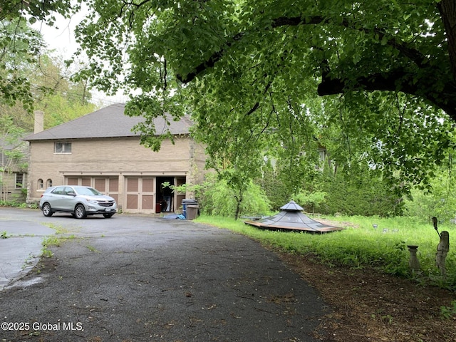 1077 University Pl, Schenectady, NY 12308 - view of property exterior featuring driveway
