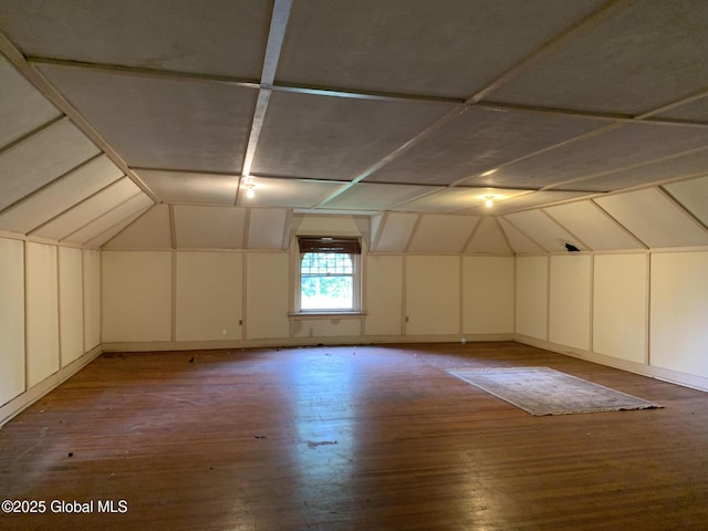 1077 University Pl, Schenectady, NY 12308 - bonus room with vaulted ceiling, wood finished floors, and a decorative wall