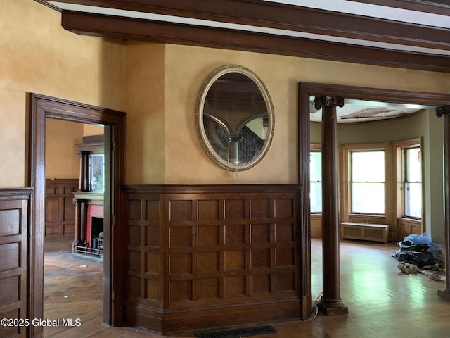 1077 University Pl, Schenectady, NY 12308 - foyer featuring a decorative wall, wainscoting, wood finished floors, and radiator heating unit