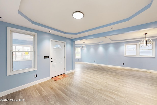 1813 Ave A, Schenectady, NY 12308 - foyer entrance with light wood finished floors, a raised ceiling, and baseboards