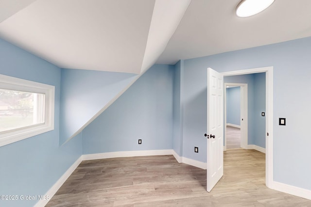 1813 Ave A, Schenectady, NY 12308 - additional living space featuring light wood-style flooring, lofted ceiling, and baseboards