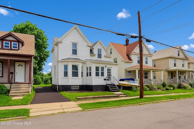 1813 Ave A, Schenectady, NY 12308 - view of front facade featuring a residential view, a front yard, and a porch